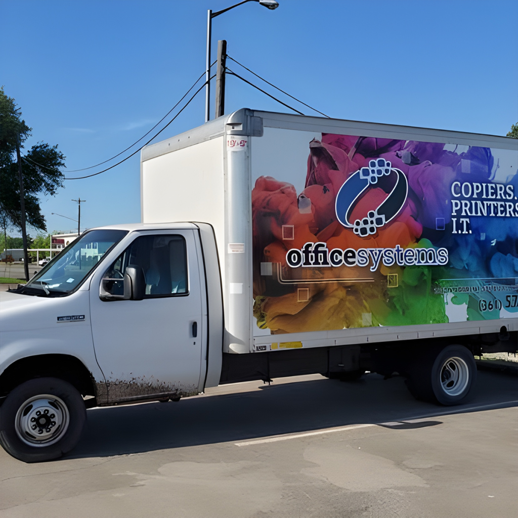 A company truck with a colorful advertisement wrapped around the side.